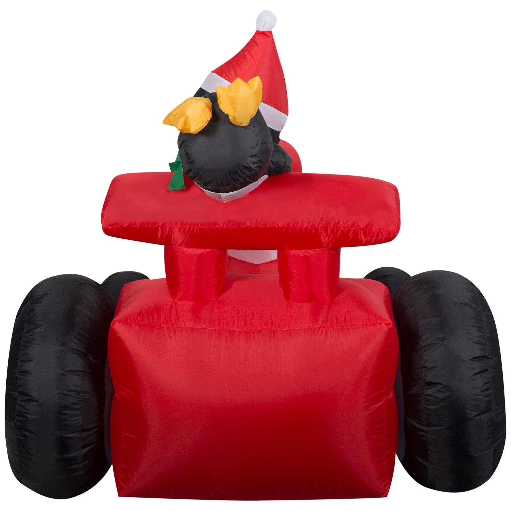 7.5ft. Airblown® Inflatable Santa in Racecar with Penguins